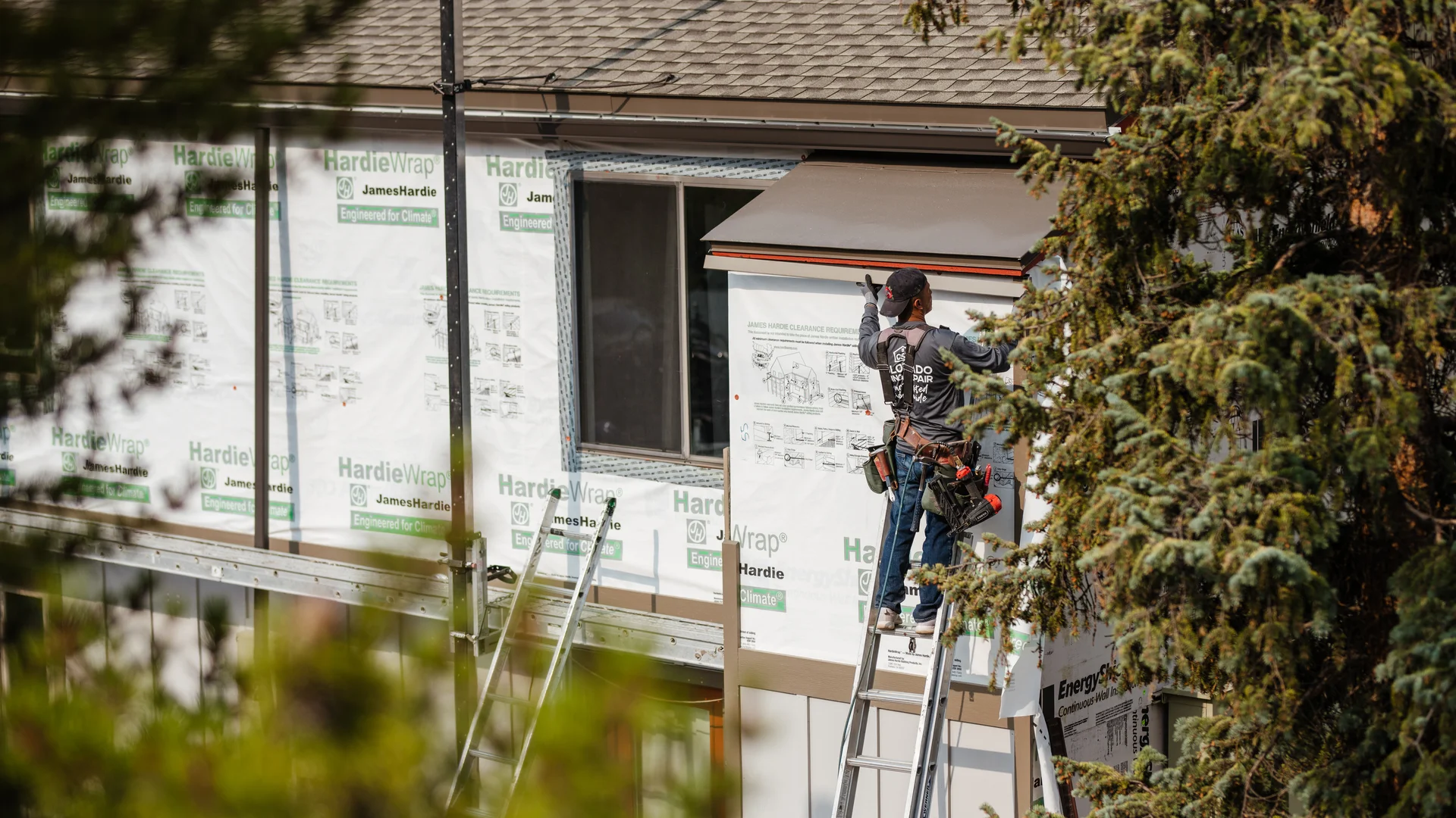 HOA board visiting completed siding projects