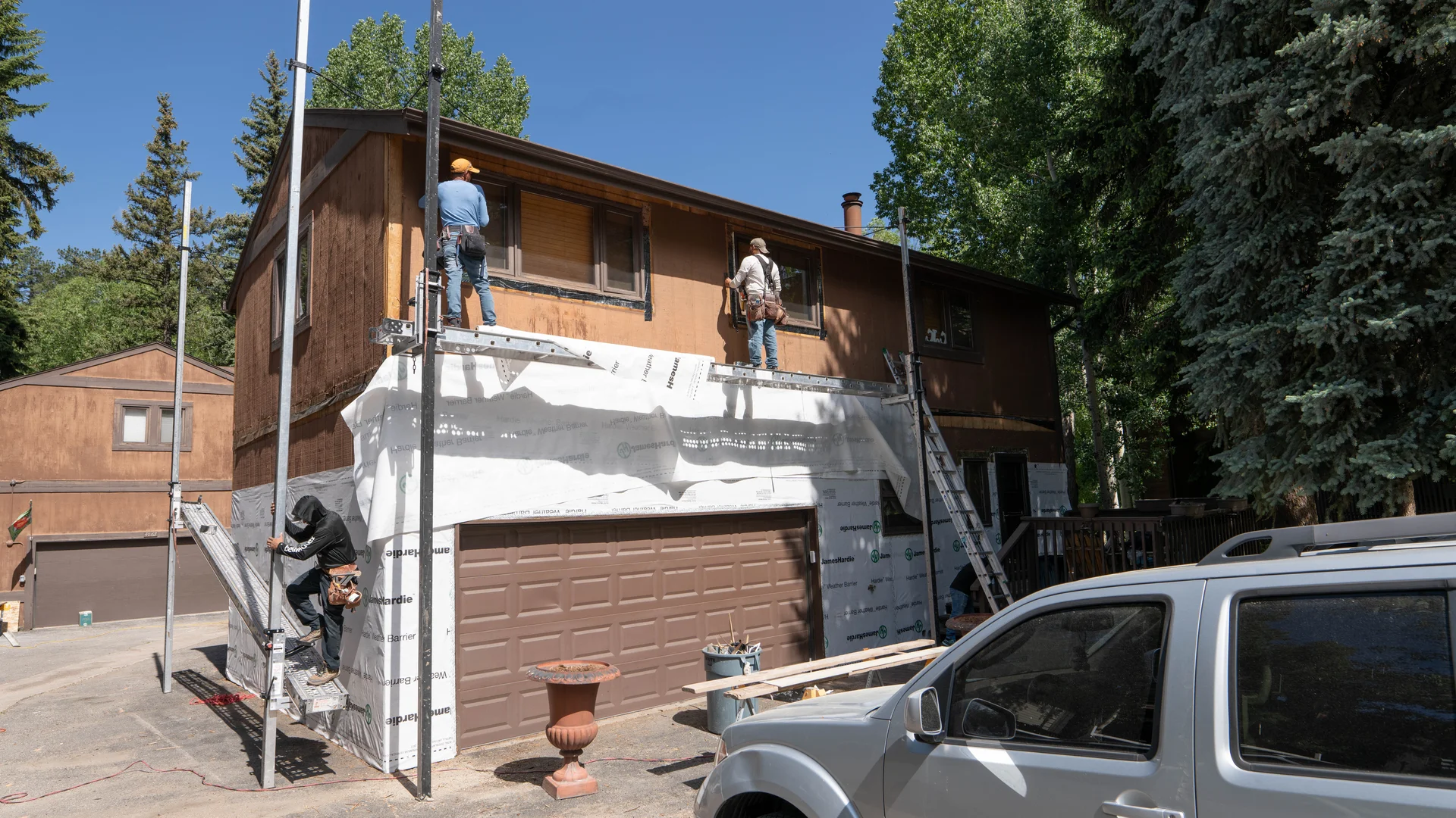 Pre-construction planning meeting with contractors and HOA board